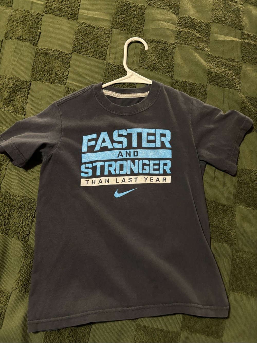 Nike Black Tee with Blue 'Faster and Stronger' Graphic